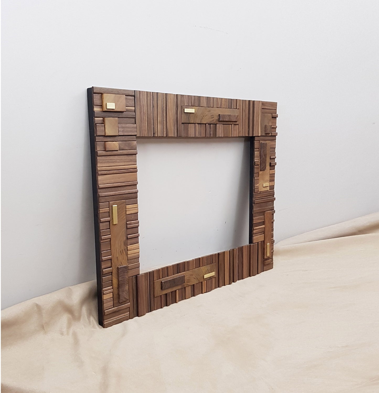 Handmade centrepiece statement mirror frame in walnut and brass