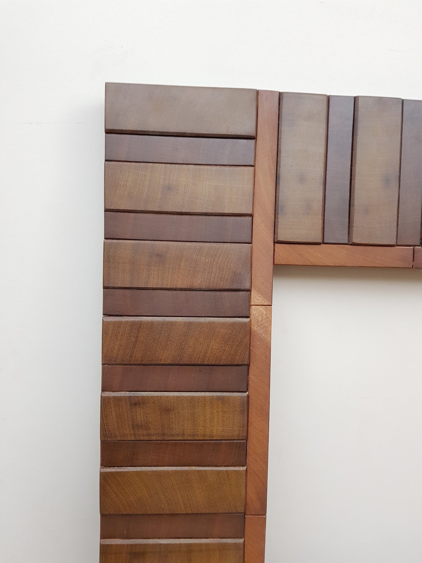 Square wooden mirror frame in end grain mahogany.