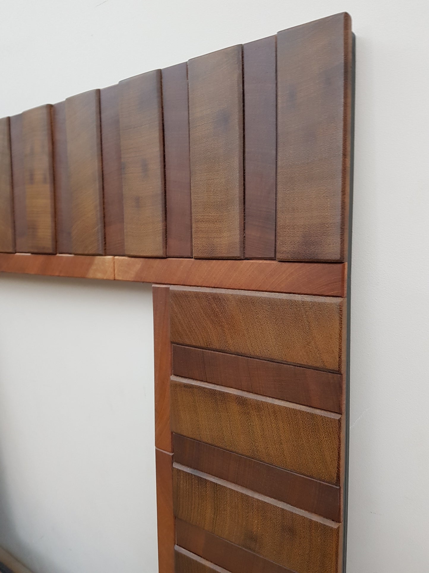 Square wooden mirror frame in end grain mahogany.