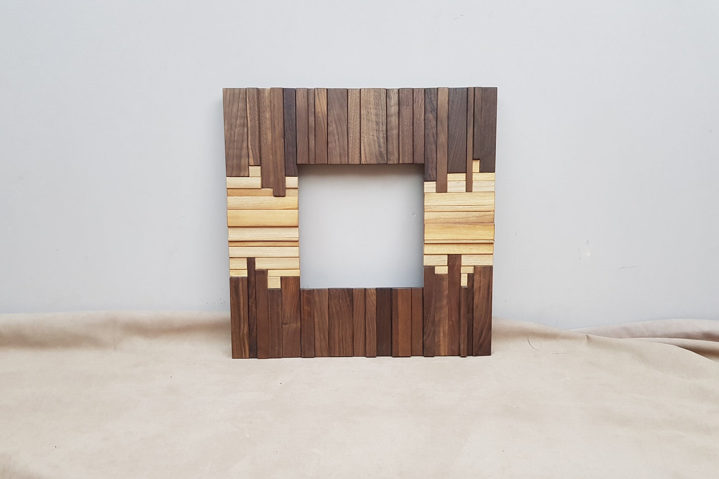 Handmade wooden mirror frame in walnut