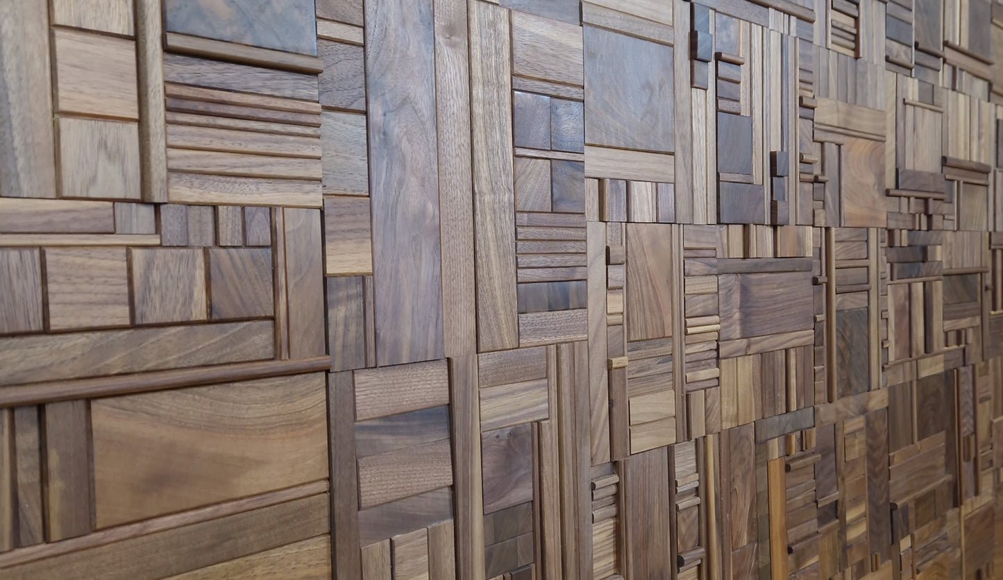 Black walnut wooden wall tiles in random pattern