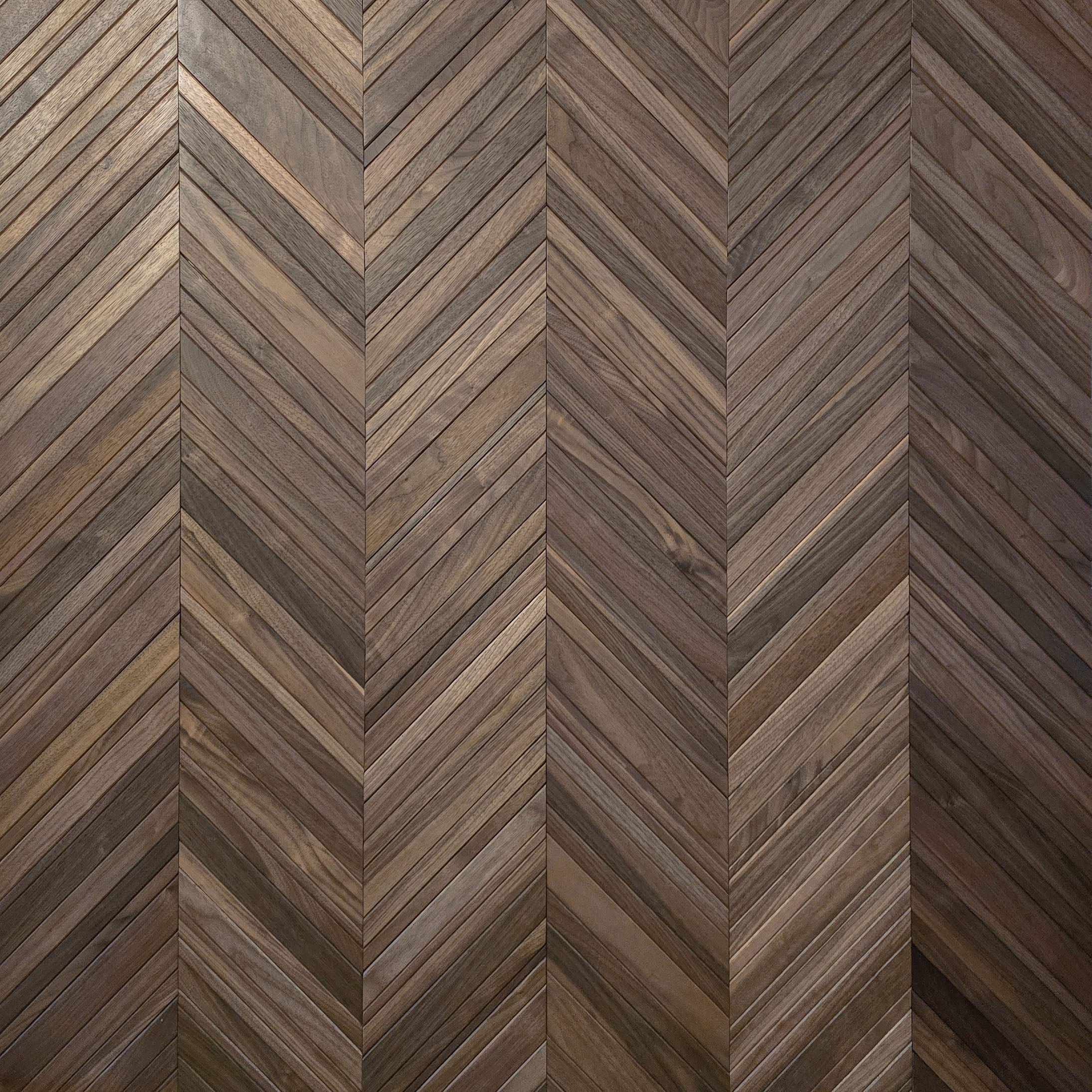Wooden panel with a chevron pattern in brown tones