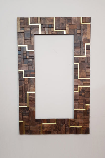 Large centrepiece statement mirror frame in figured walnut and brass