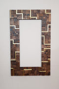 Large centrepiece statement mirror frame in figured walnut and brass