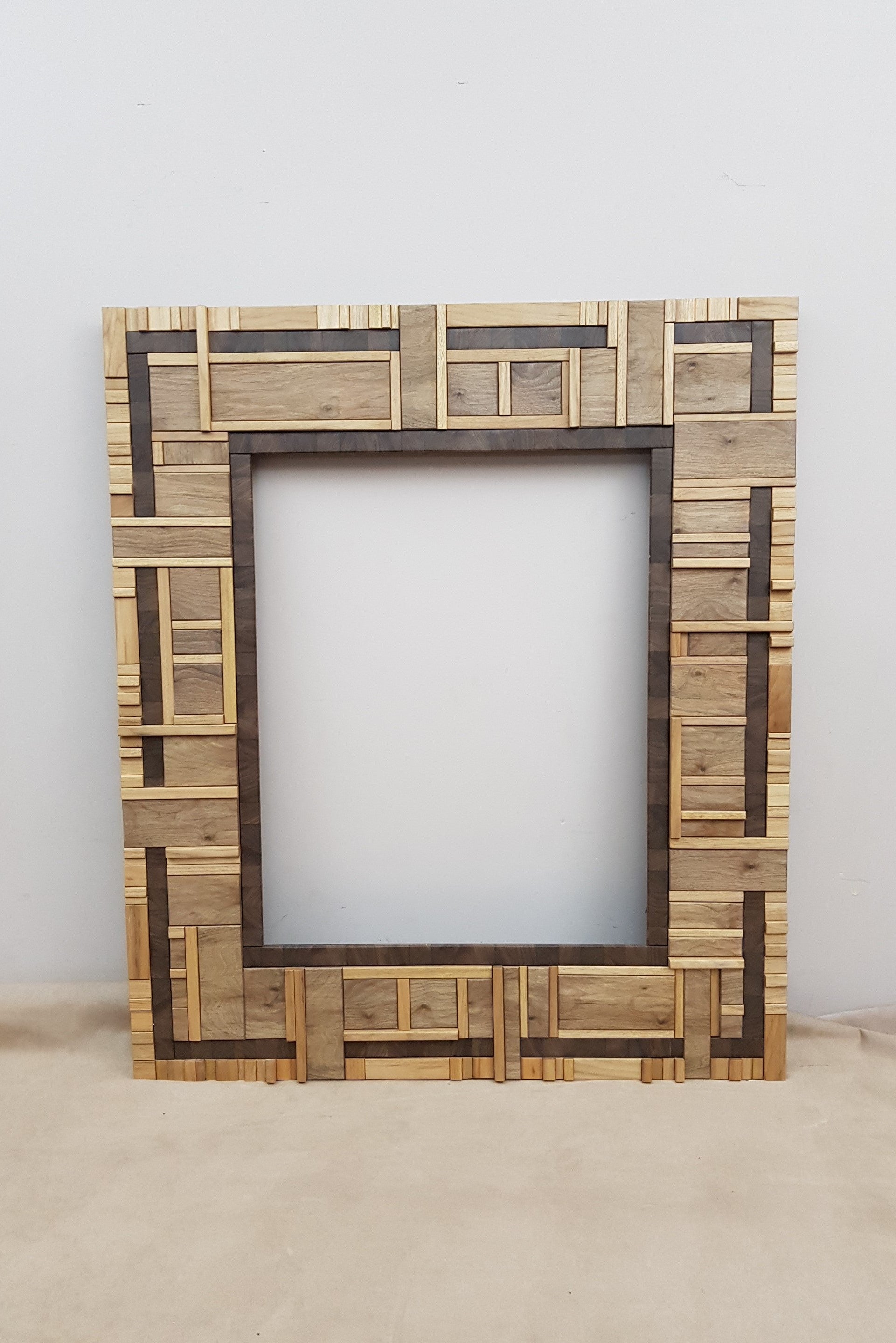 Centrepiece statement artwork mirror frame in walnut
