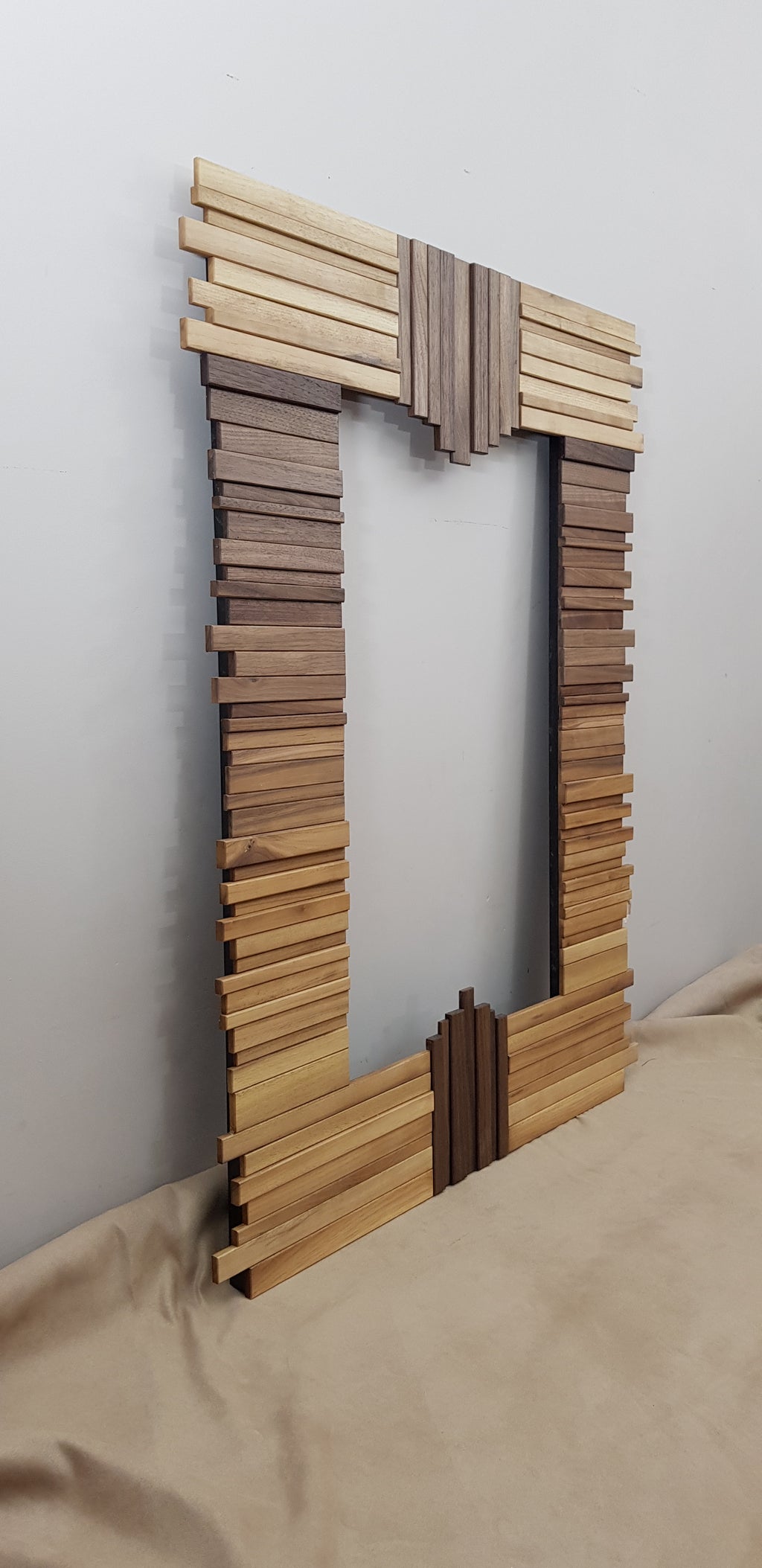 Centrepiece mirror in black and white walnut