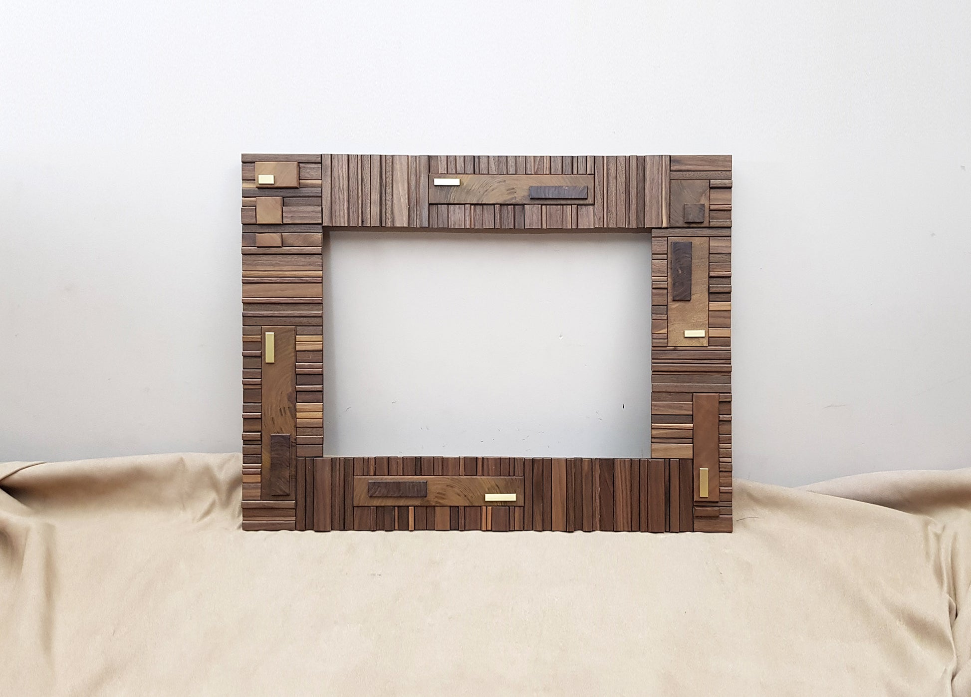Handmade centrepiece statement mirror frame in walnut and brass