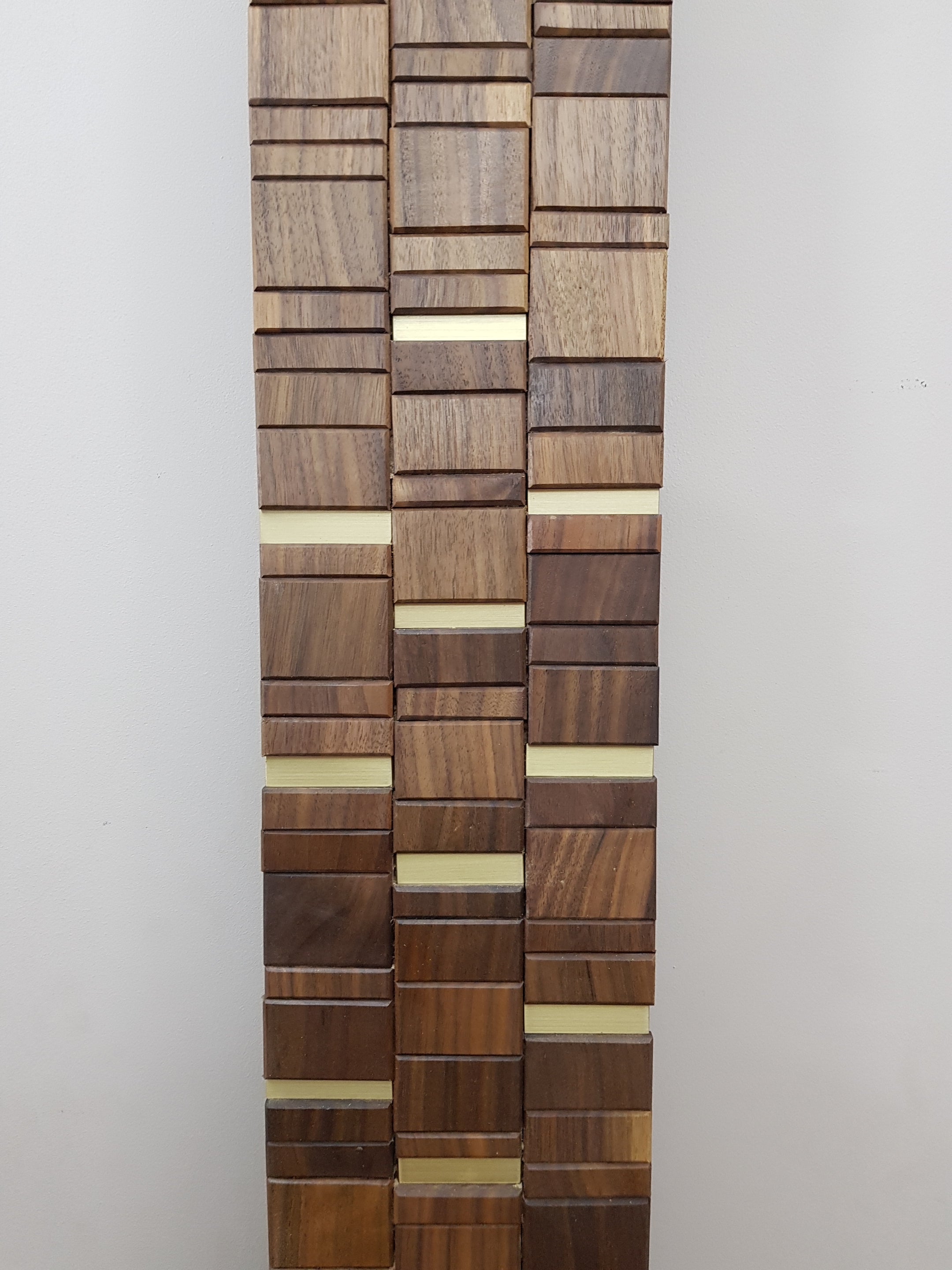 Walnut and brass mirror frame.