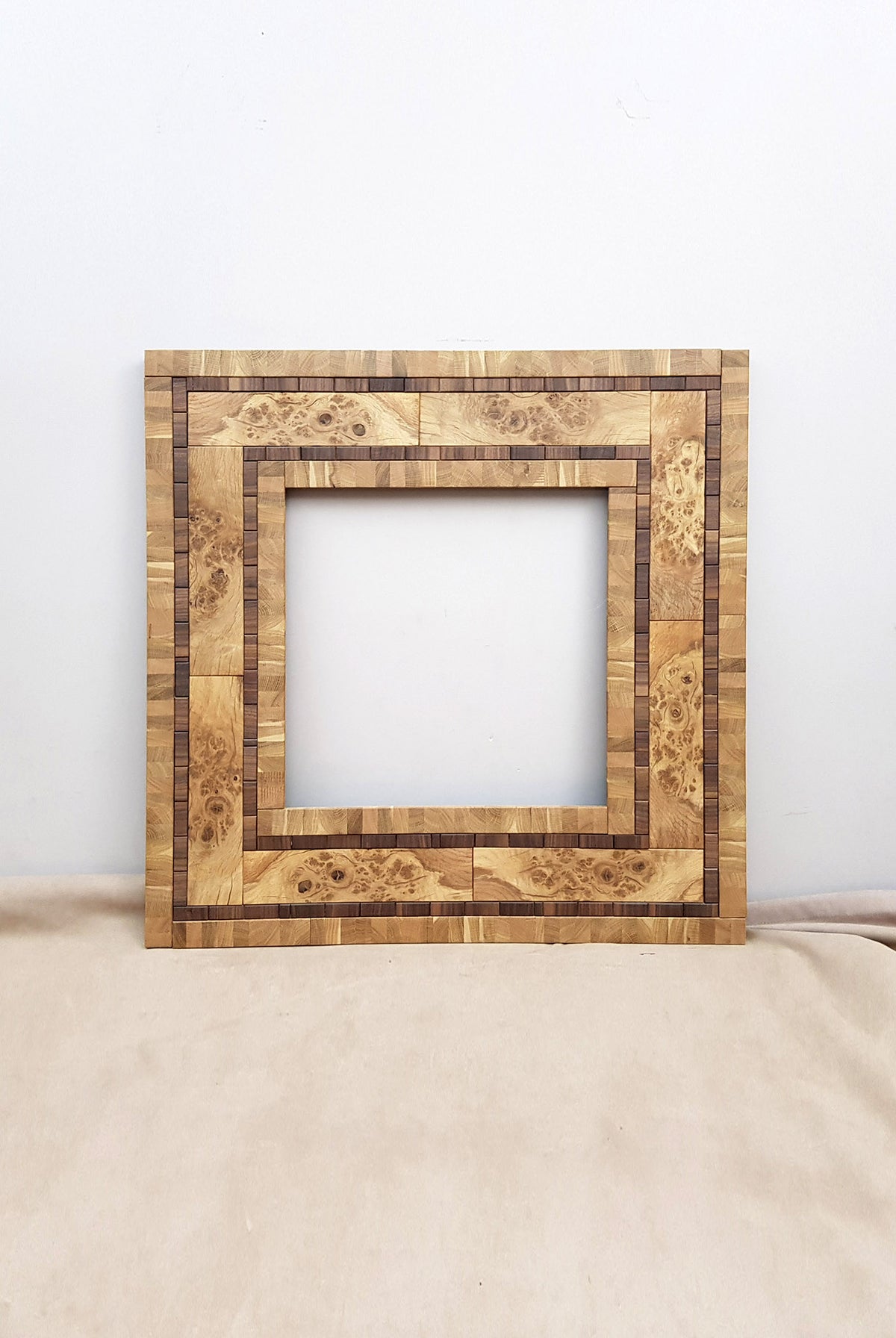 Centrepiece statement mirror frame in figured oak and walnut – Artimatum