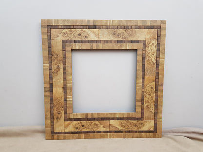 Centrepiece statement mirror frame in figured oak and walnut