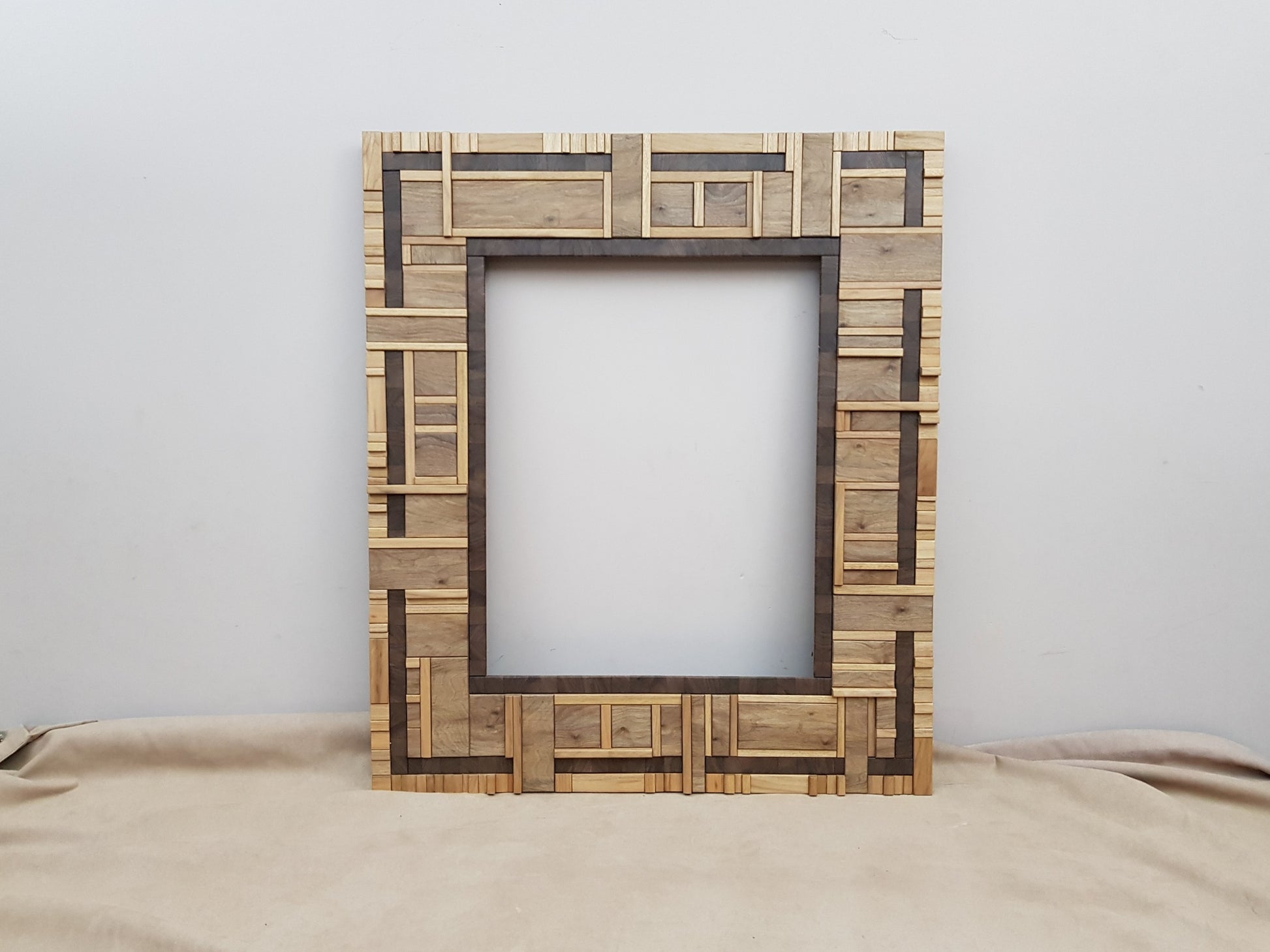 Centrepiece statement artwork mirror frame in walnut