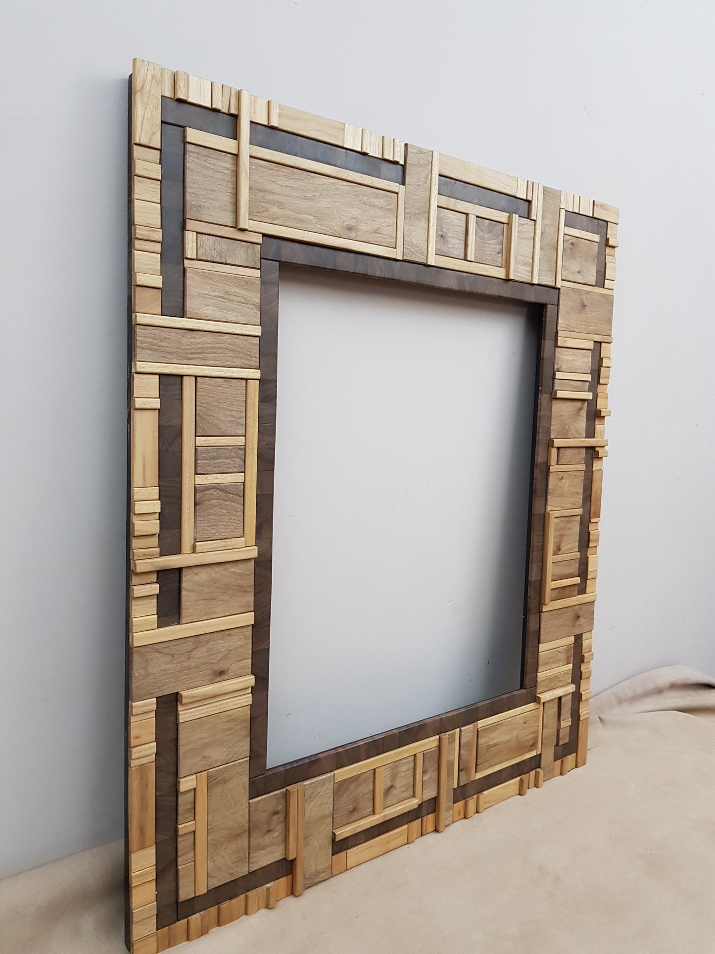 Centrepiece statement artwork mirror frame in walnut