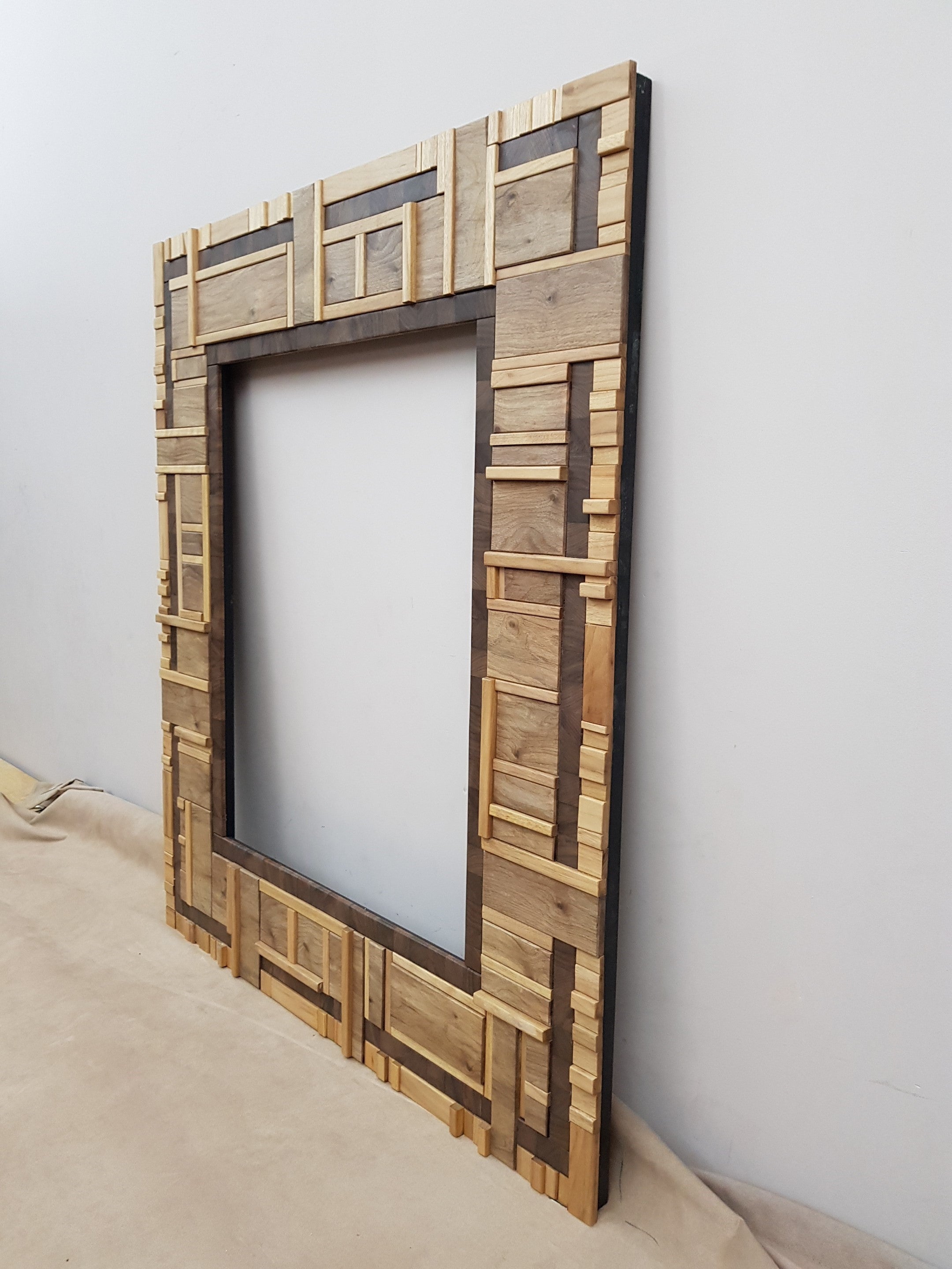 Centrepiece statement artwork mirror frame in walnut