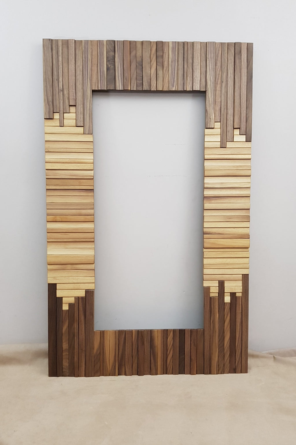 Centrepiece mirror in black and white walnut