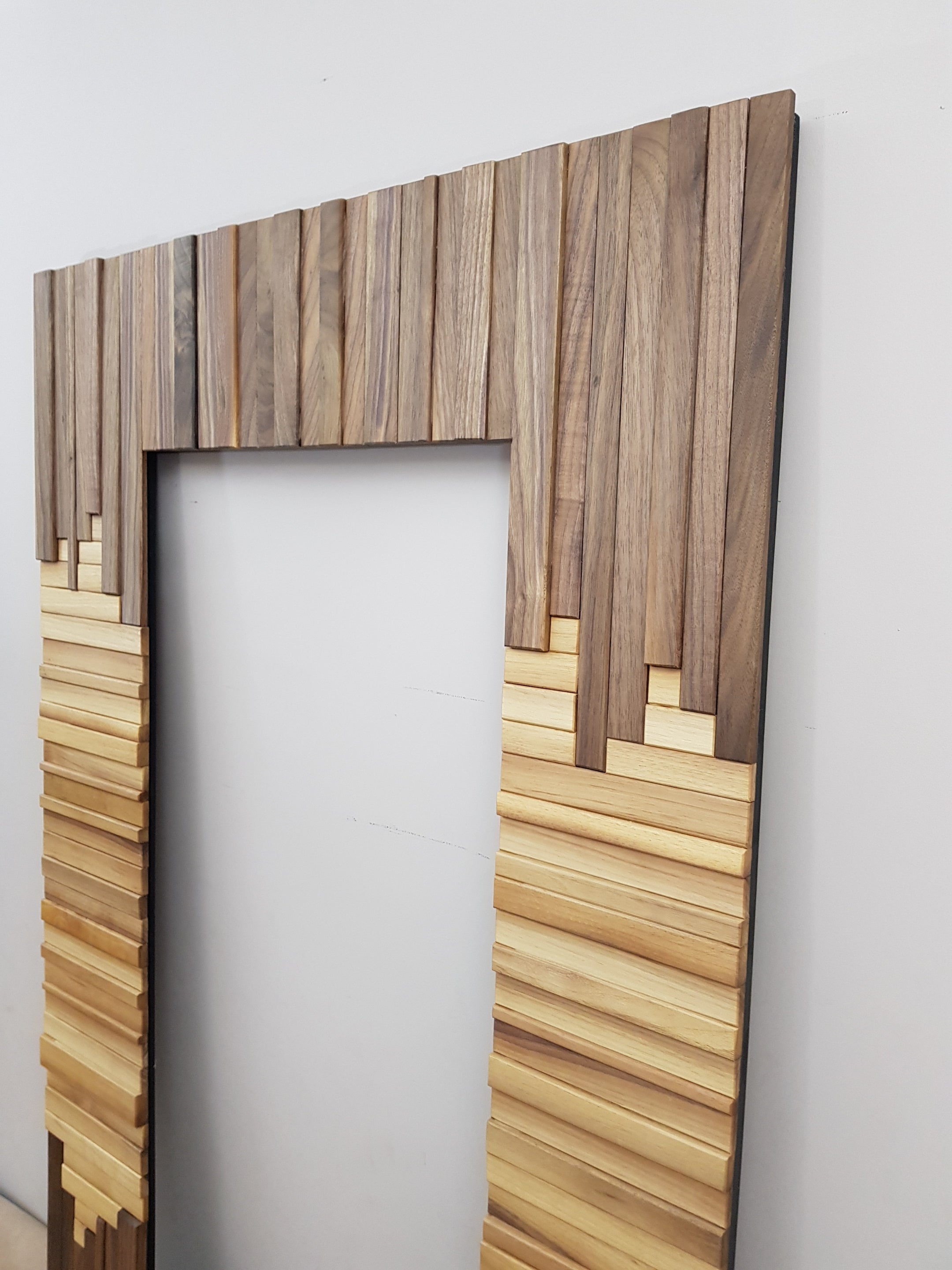 Centrepiece mirror in black and white walnut