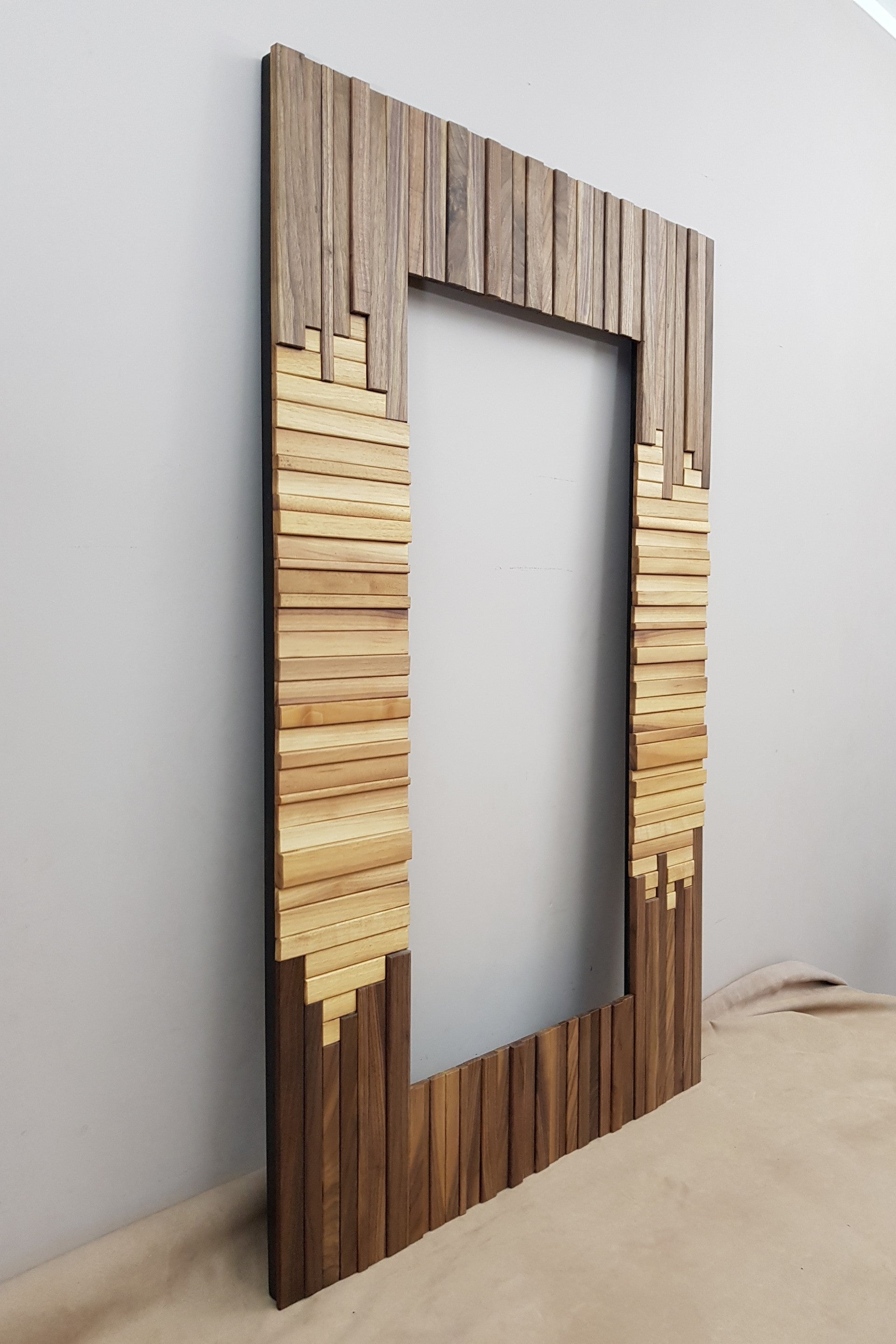 Centrepiece mirror in black and white walnut