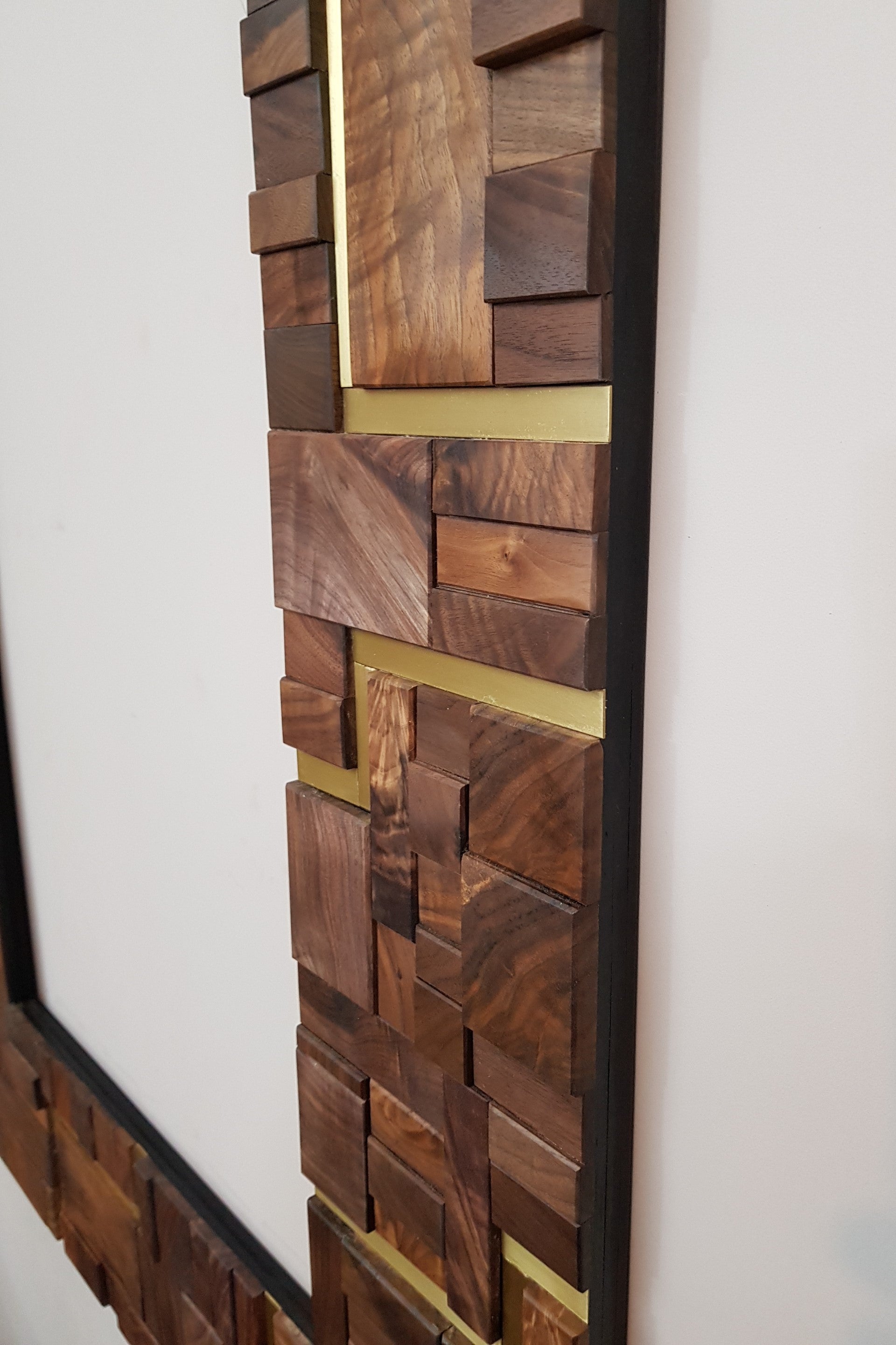 Large centrepiece statement mirror frame in figured walnut and brass