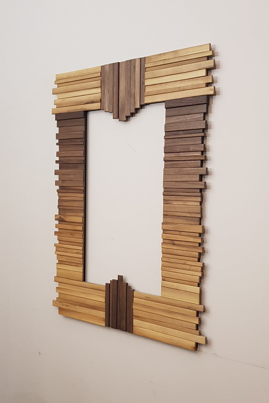 Centrepiece mirror in black and white walnut