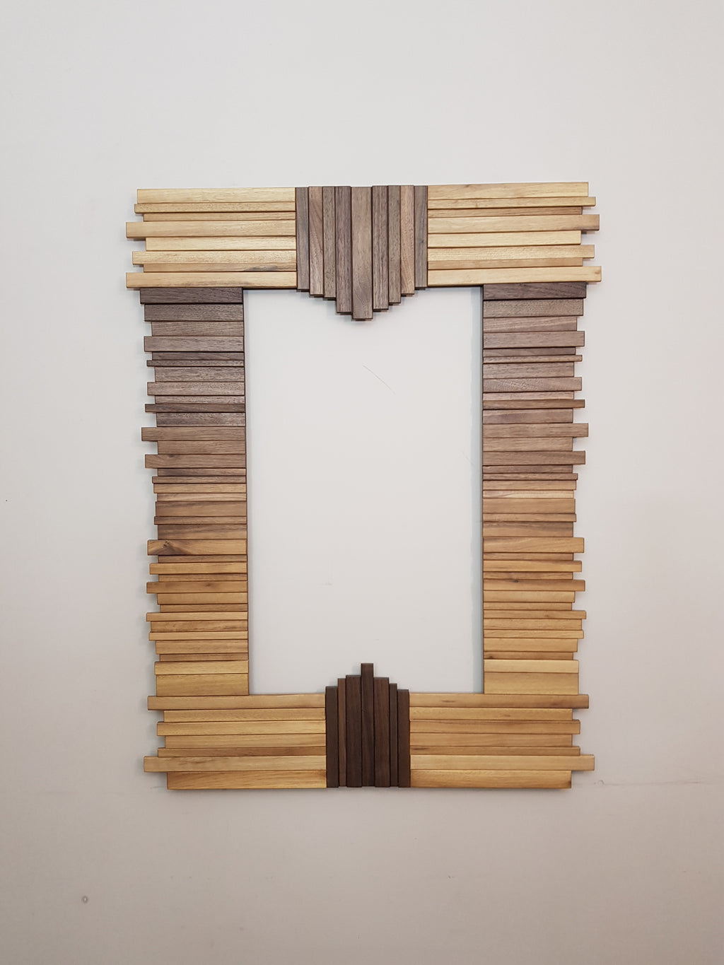 Centrepiece mirror in black and white walnut