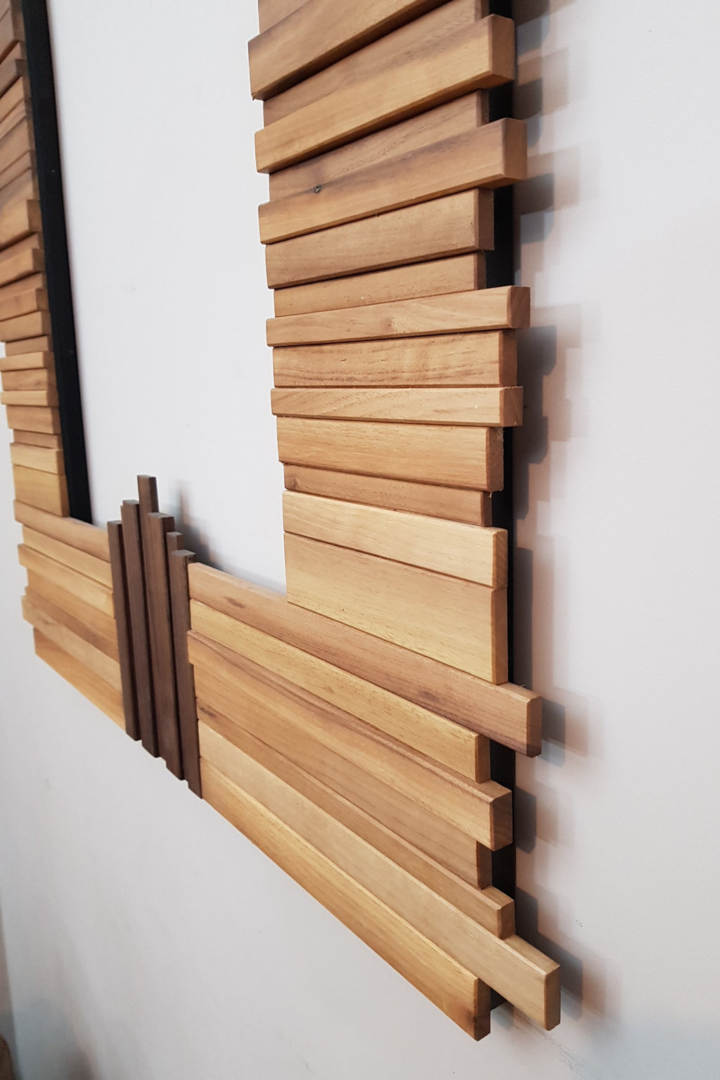 Centrepiece mirror in black and white walnut