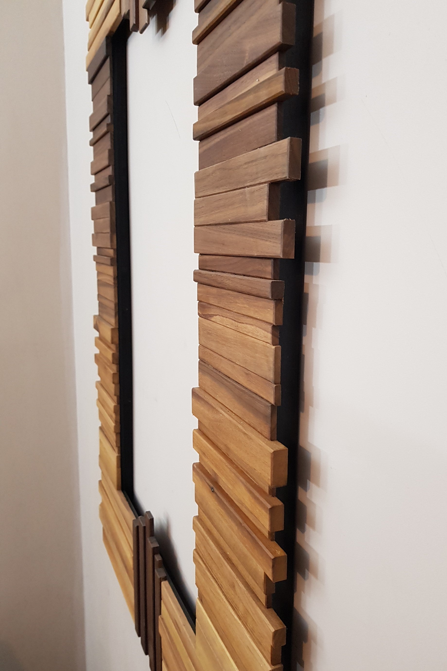 Centrepiece mirror in black and white walnut