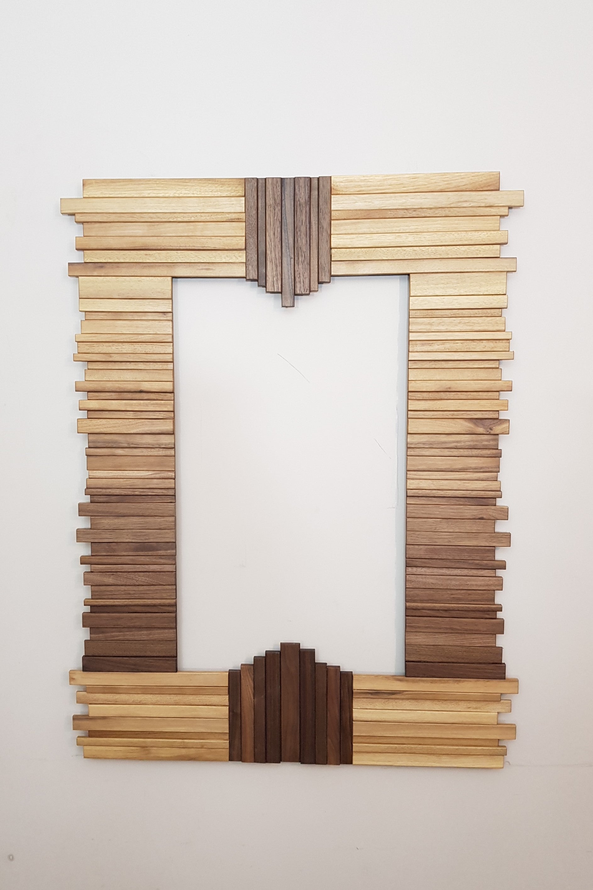 Centrepiece mirror in black and white walnut