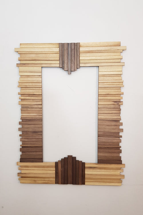 Centrepiece mirror in black and white walnut