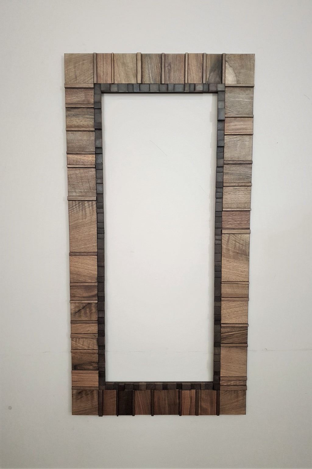 Living room statement mirror frame in walnut