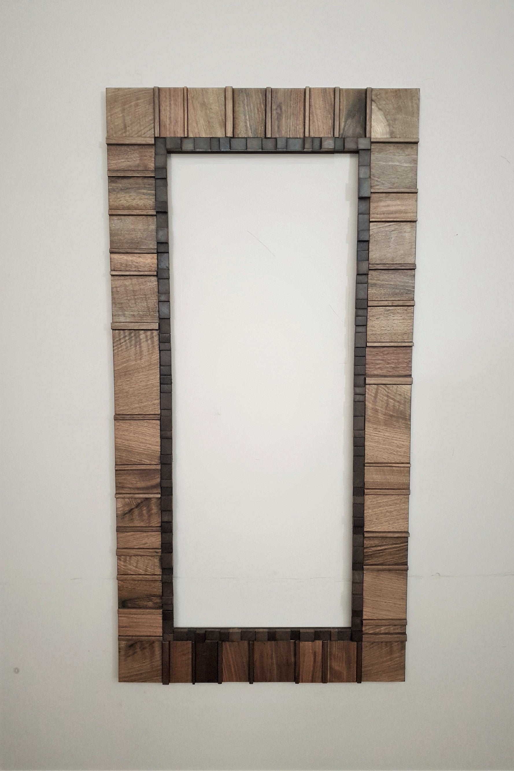 Living room statement mirror frame in walnut