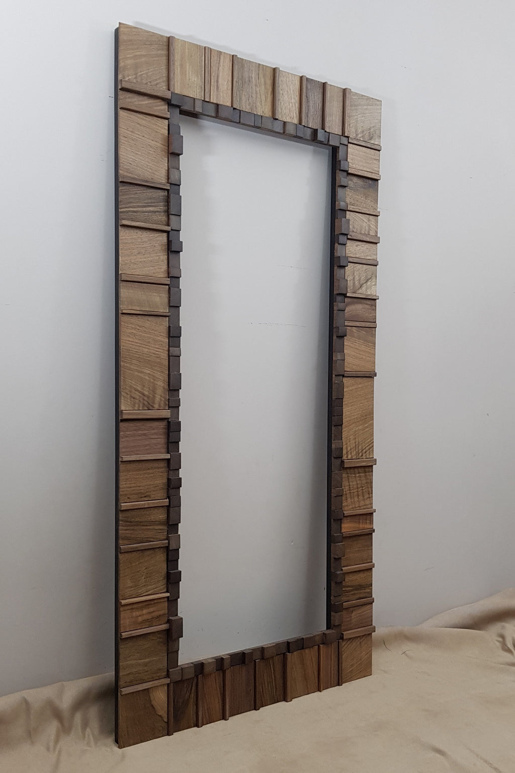 Living room statement mirror frame in walnut