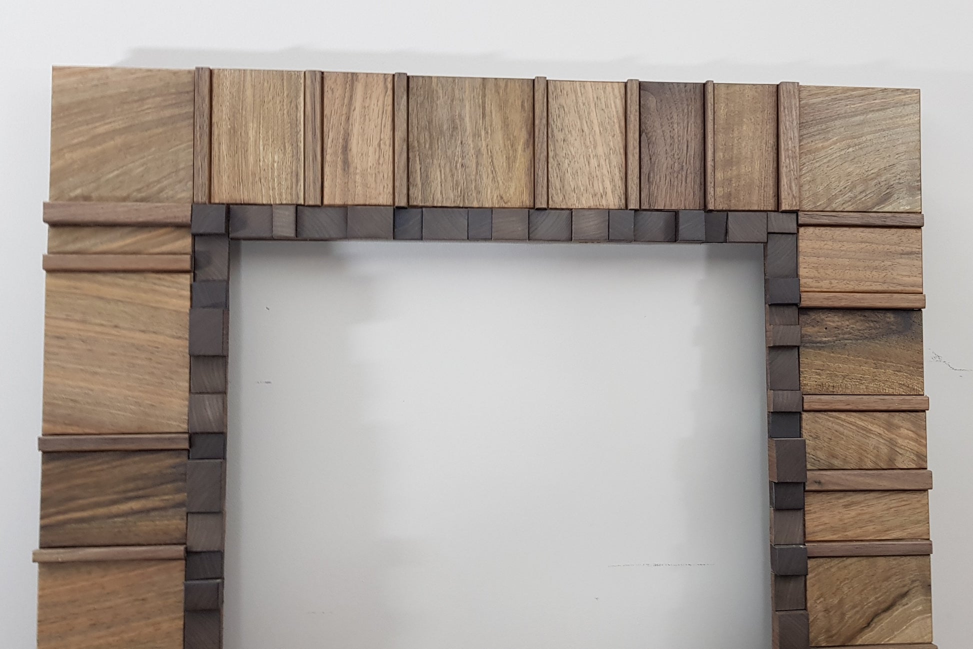 Living room statement mirror frame in walnut