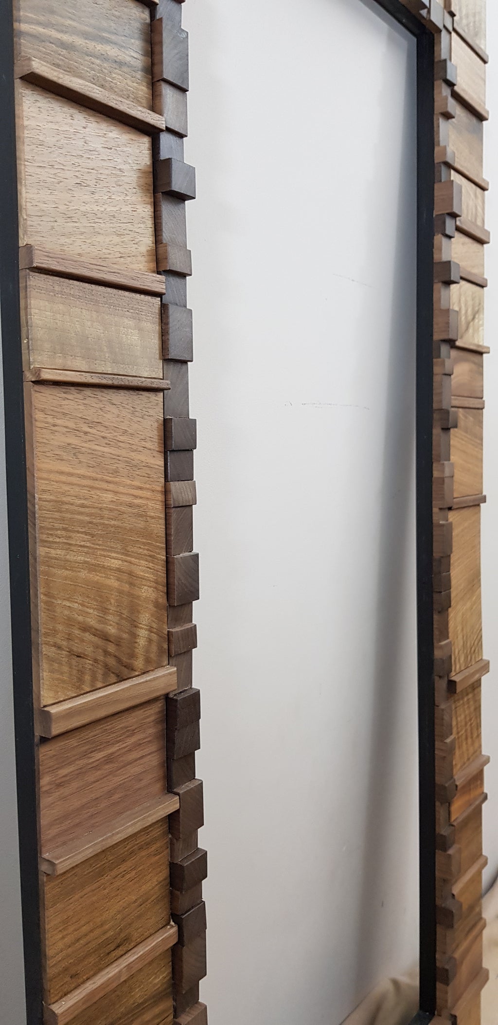 Living room statement mirror frame in walnut