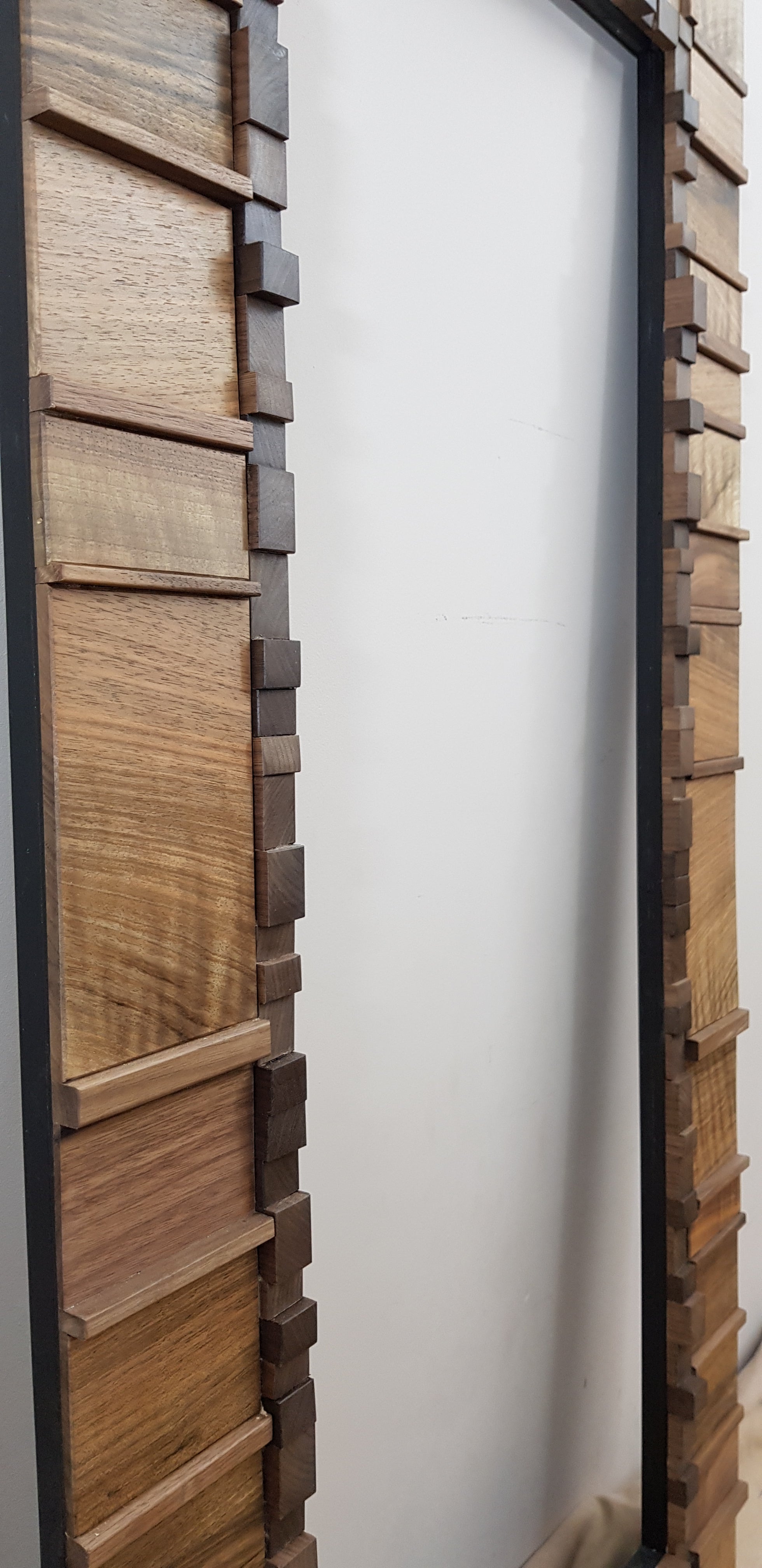 Living room statement mirror frame in walnut