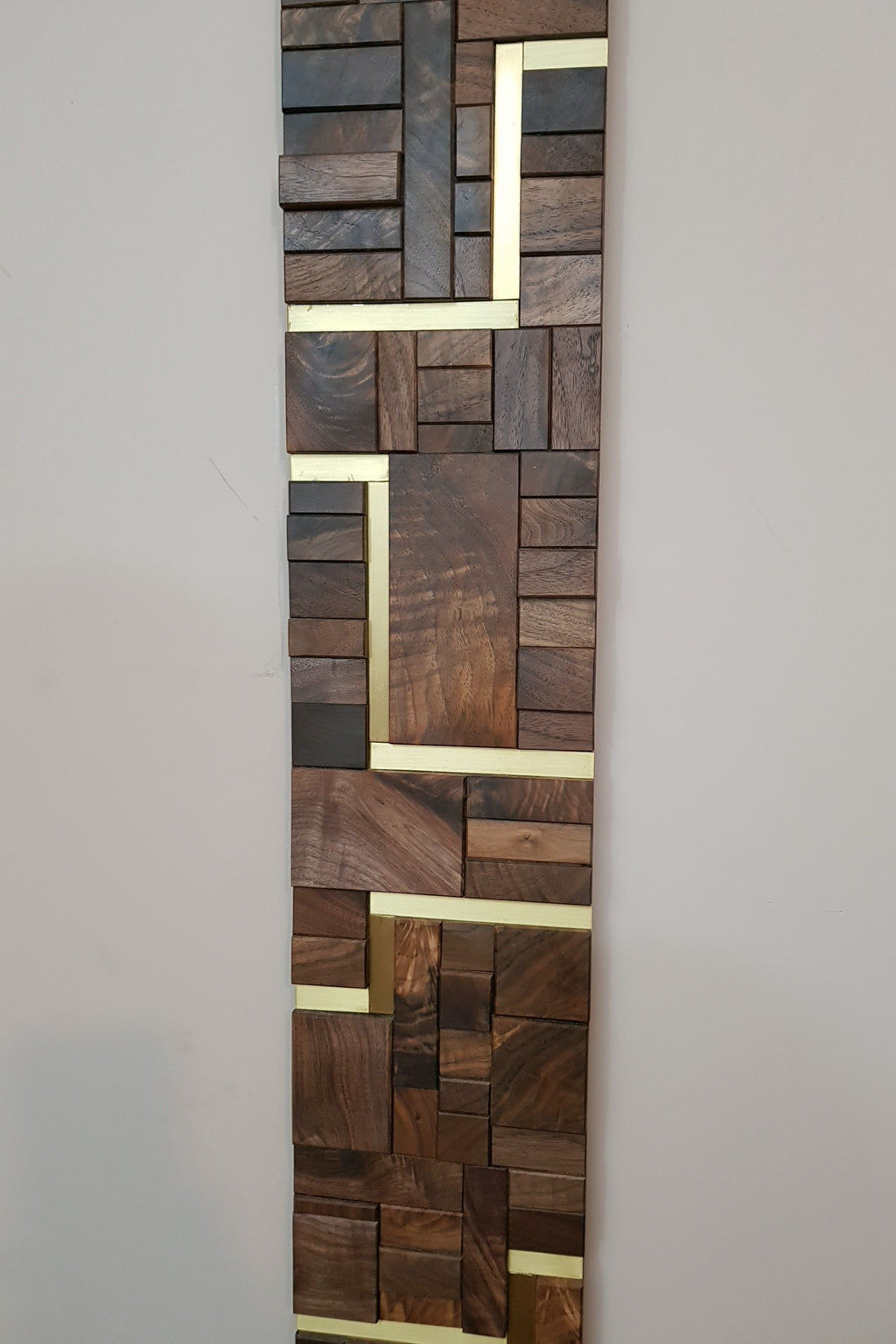 Large centrepiece statement mirror frame in figured walnut and brass